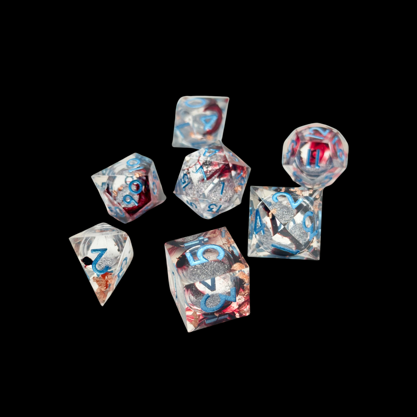 Jeu de dés Donjons et Dragons en résine à noyau liquide bleu/rouge/argent